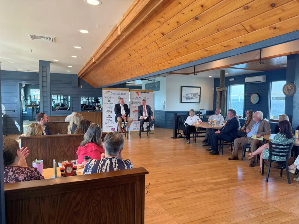 People attending a business meeting in a restaurant.